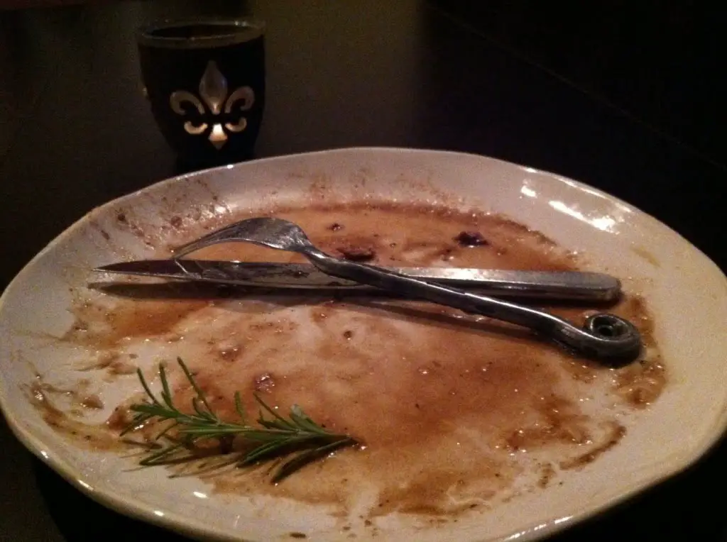 empty prime rib dinner plate