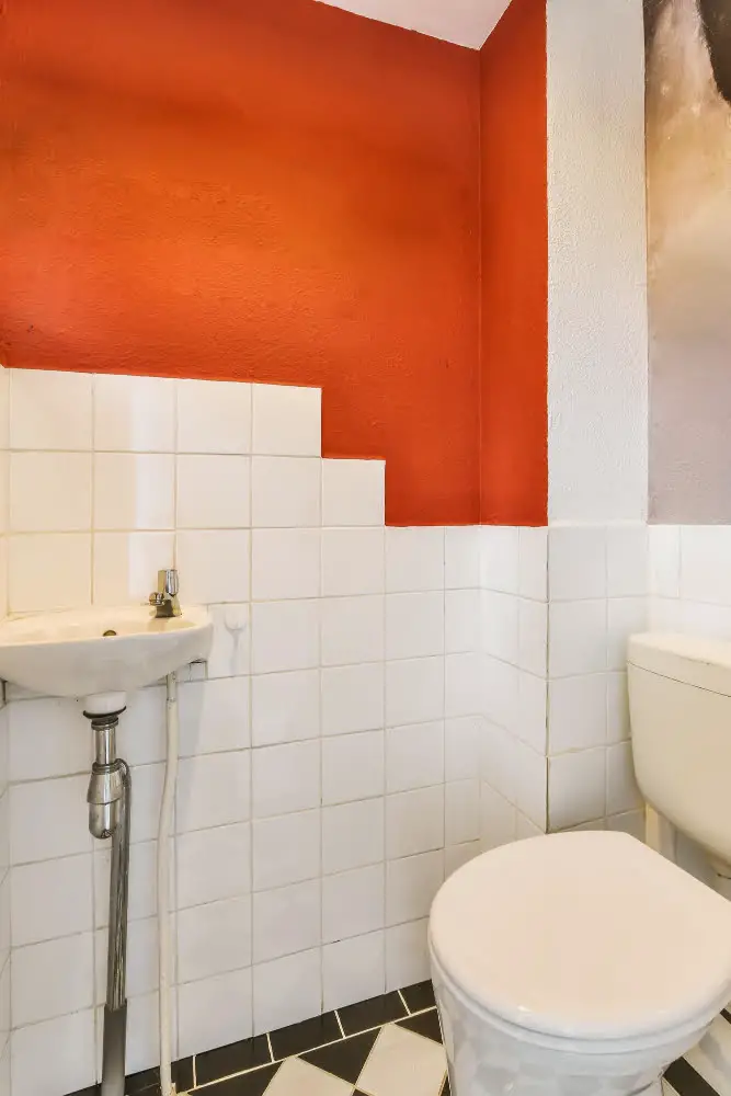 Orange and White bathroom