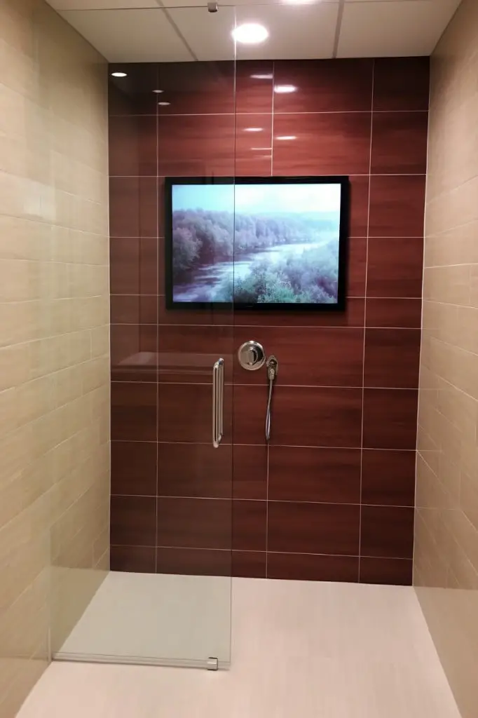 in shower tv installation with glass protection