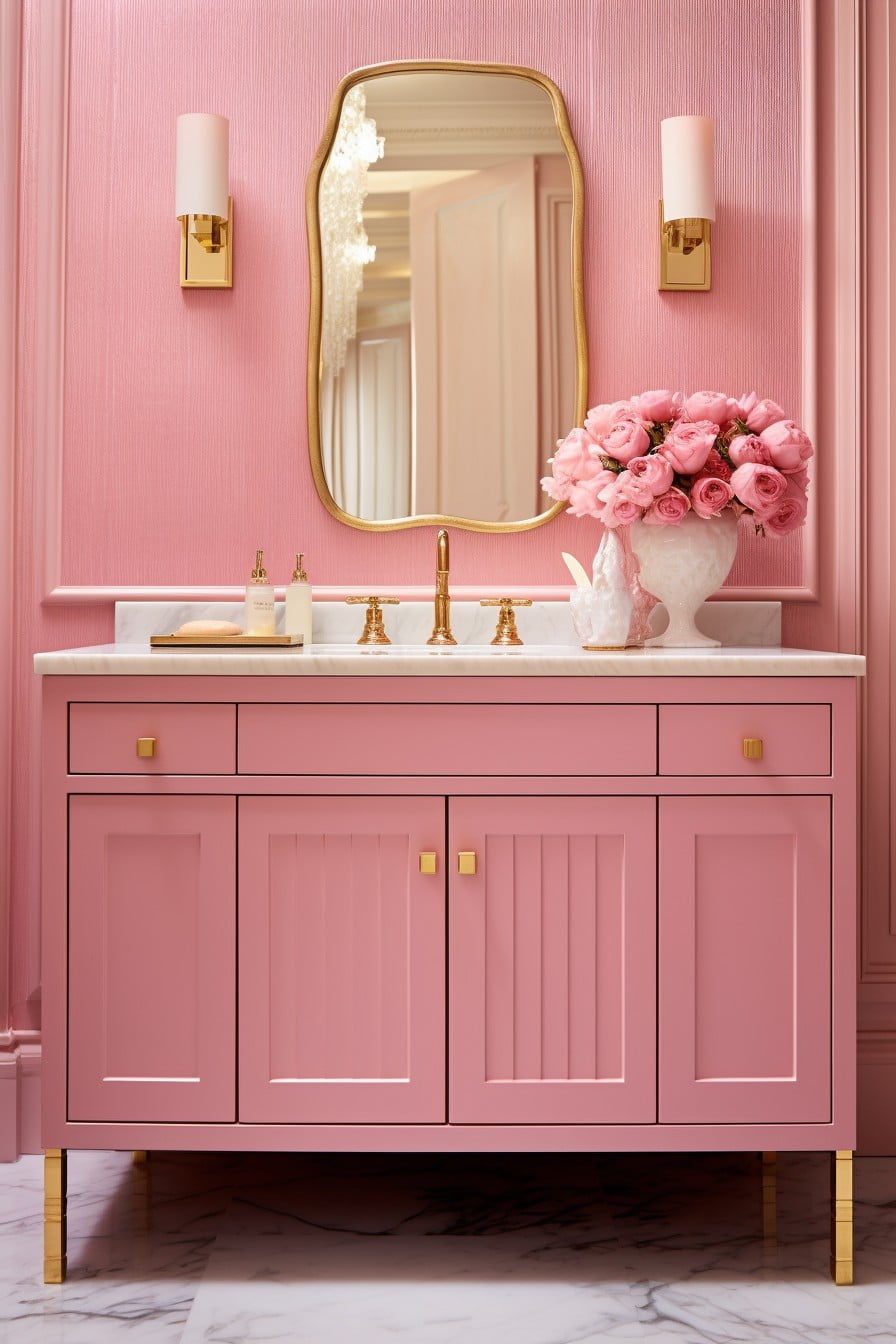 pink vanity cabinets with gold hardware