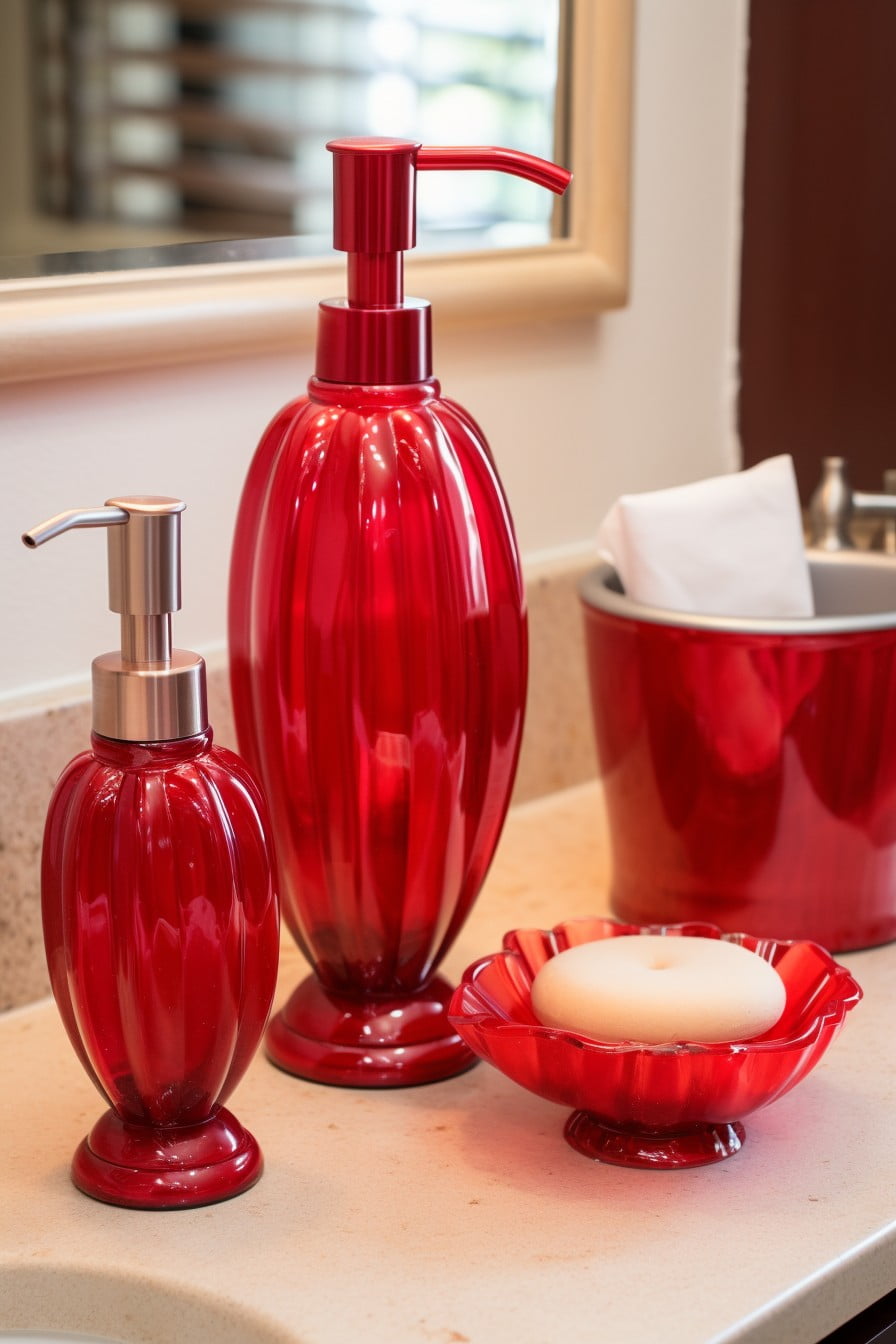 red soap dispenser and toothbrush holder