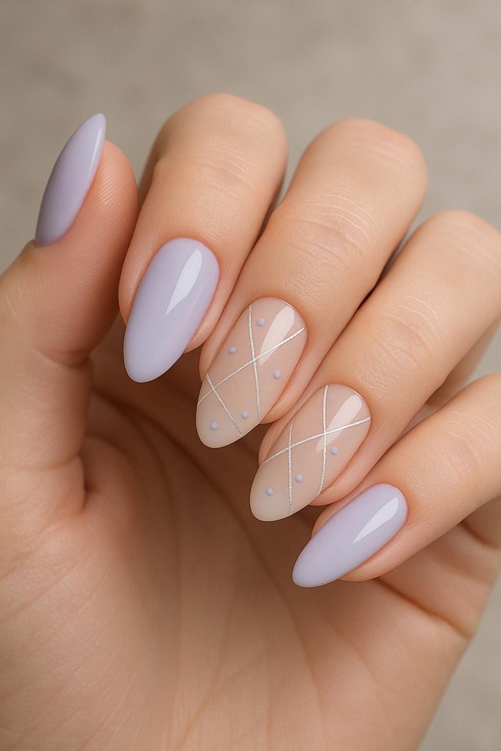 Pale purple nails with crisscross stripes and tiny dots