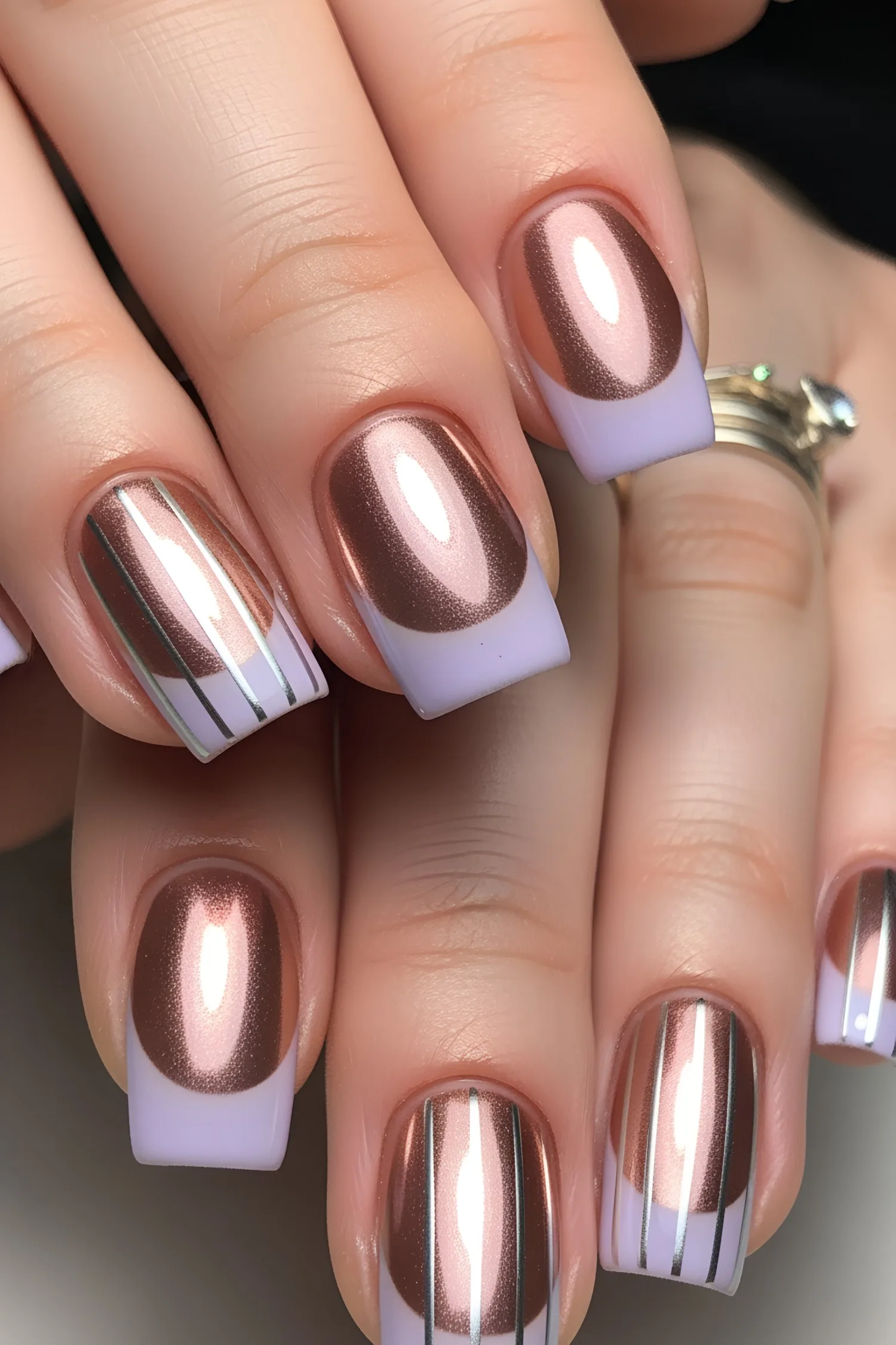 Square nails with copper chrome finish and soft lilac tips