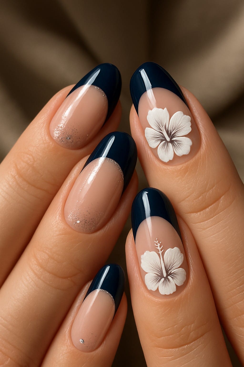 Navy French nails with white hibiscus accents