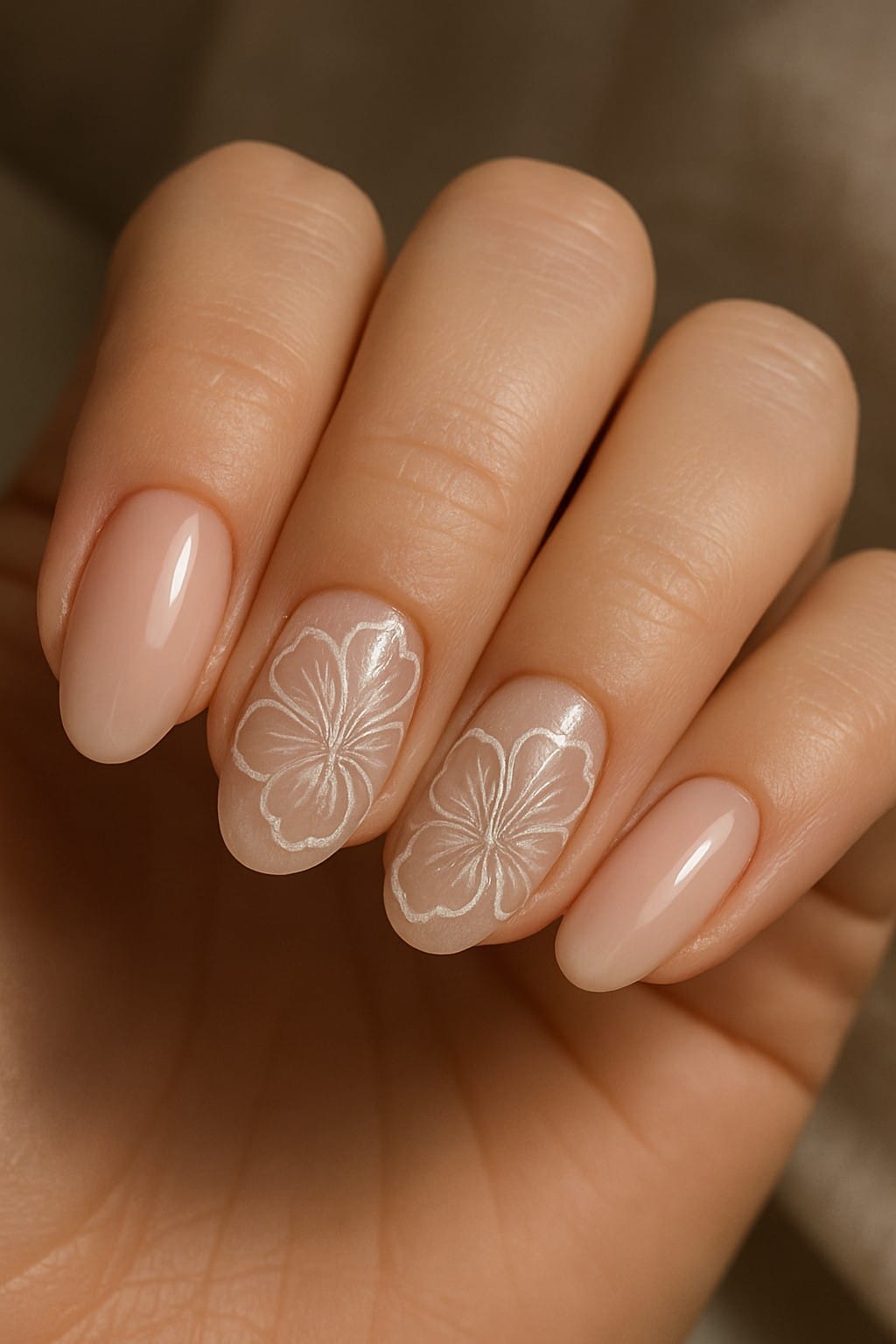 Nude nails with white hibiscus flower art