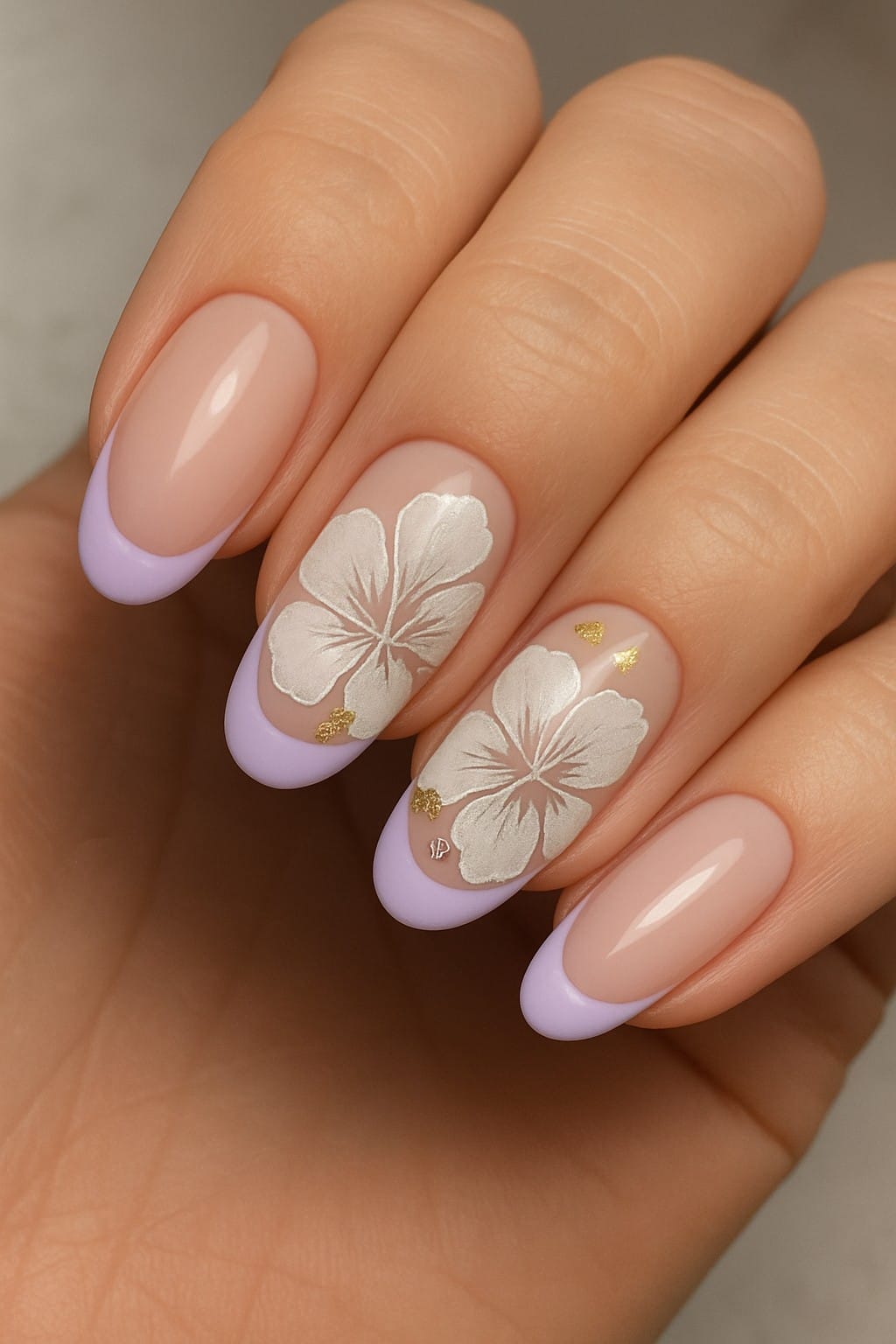 Pastel purple French tips and pearl-white hibiscus flowers