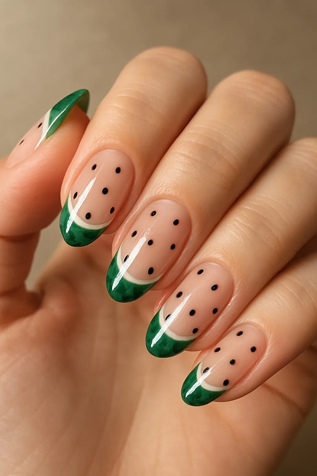 Watermelon French tip nails with black seed dots